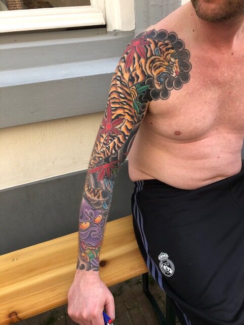 Japanse tattoo sleeve en borst